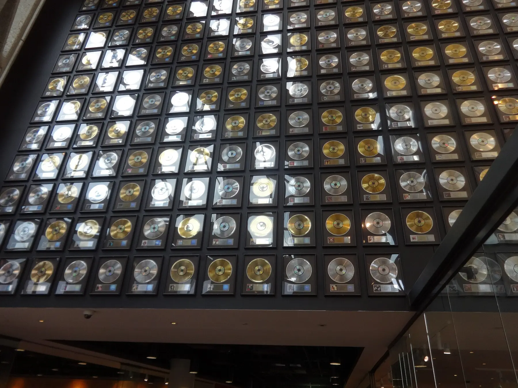 A towering wall of framed gold and platinum records inside the Country Music Hall of Fame and Museum.